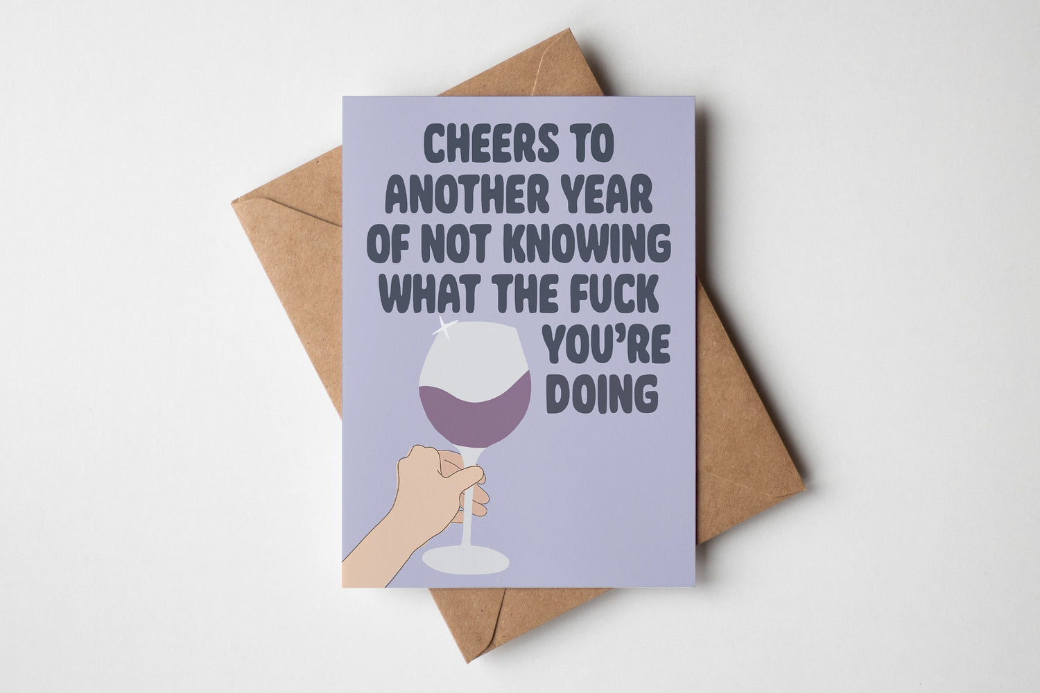 Card with a humorous message and wine graphic on a purple background