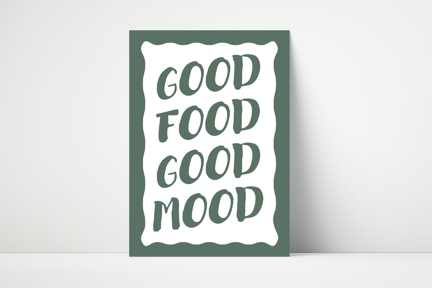 Kitchen wall art print with the phrase “Good Food Good Mood” in bold typography, perfect for food lovers and cosy dining spaces.