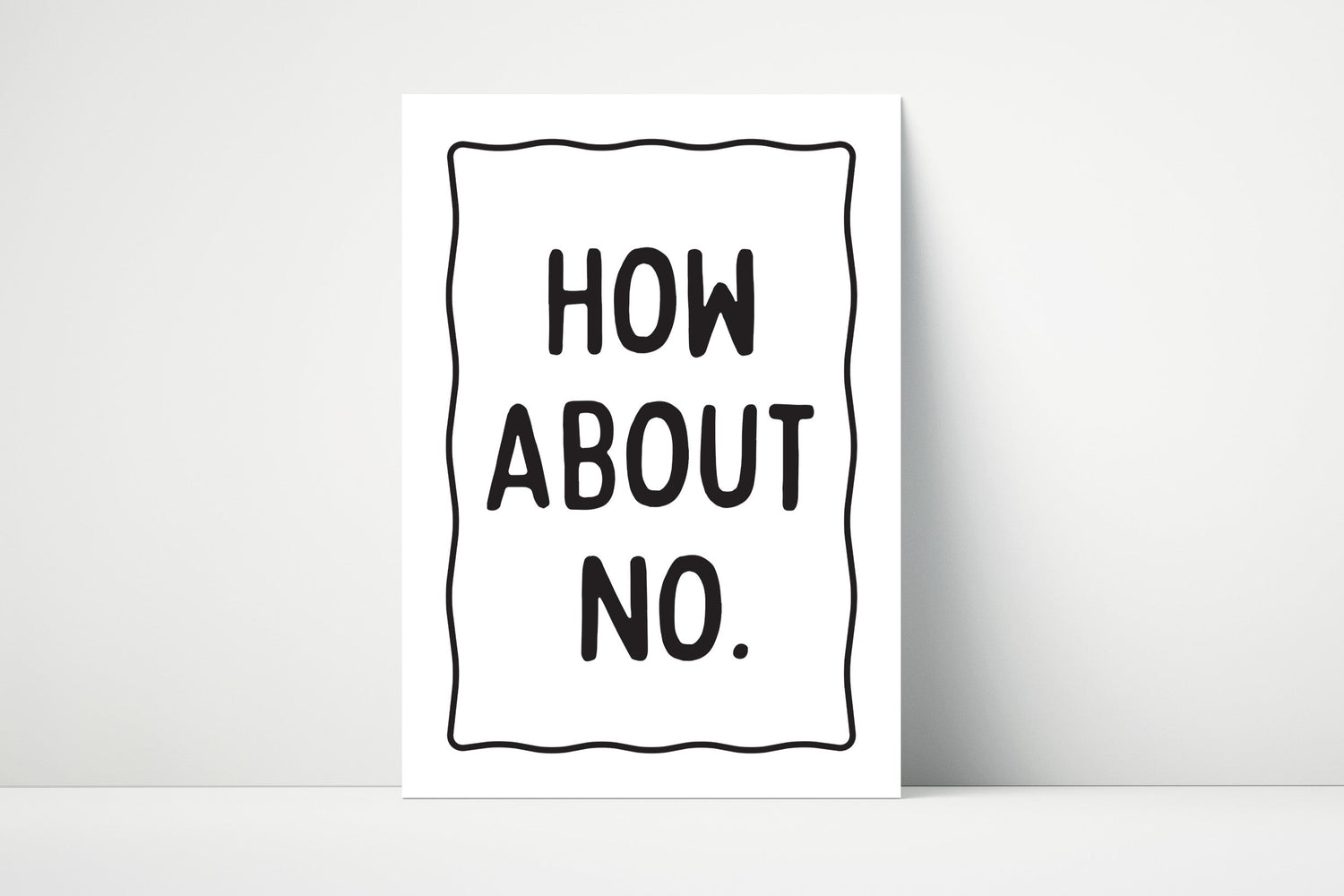 Typography wall print with bold black text that says “How About No” in minimalist style on a white background