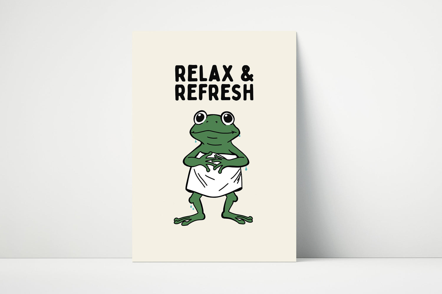 Cute bathroom wall art with a frog wearing a towel and the text “Relax and Refresh,” perfect for spa-themed or calming bathroom décor.
