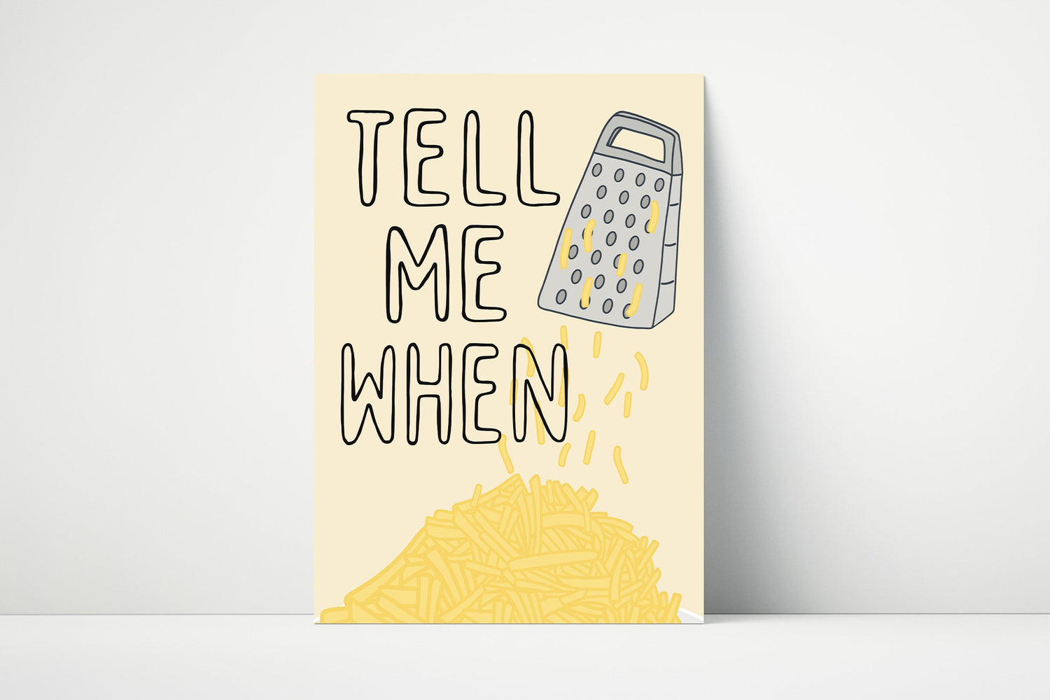 Funny kitchen wall art print that says “Tell me when” with cheese grater illustration – ideal for food lovers.