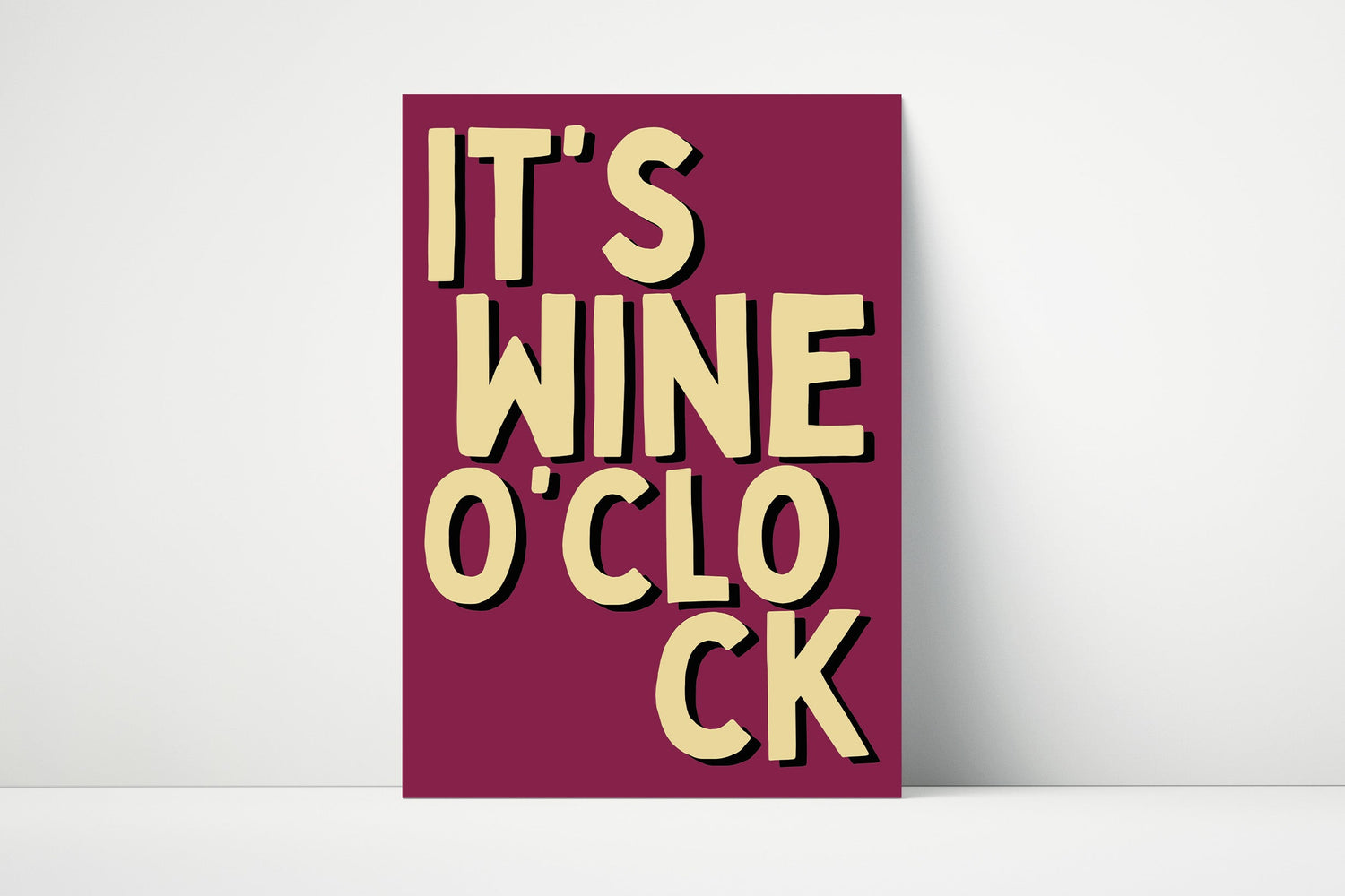 Funny “It’s Wine O'clock” wall art print in bold black typography, perfect for kitchen décor or wine-themed gallery walls.